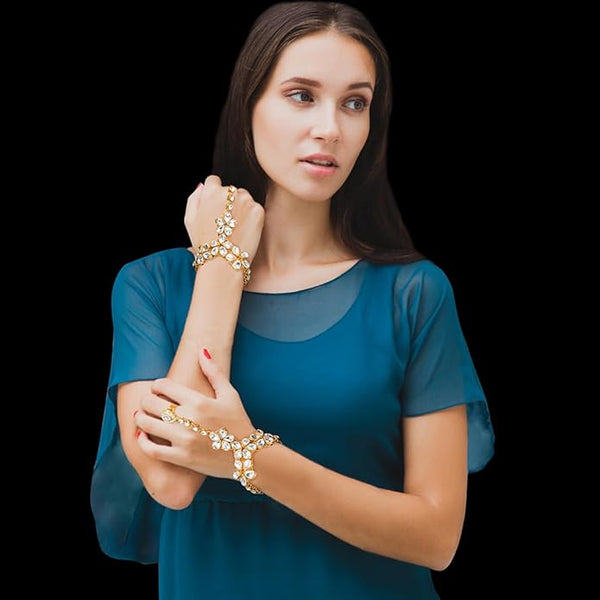 Detailed view of the Kundan hand harness showing the 4-inch connecting chain and 7-inch adjustable bracelet.
