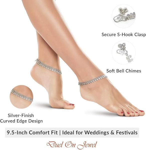 Handcrafted South Asian foot jewelry with coin-like charms and a melodic jingle bell accent.
