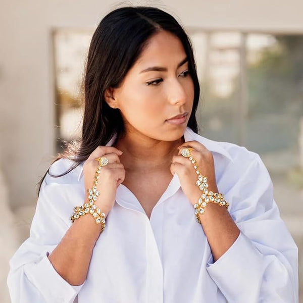 Handcrafted Indian "Hathphool" featuring radiant white stones and an adjustable ring for sizes 4 to 10.
