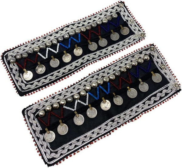 Cultural heritage anklet boot cuff with hammered metal detailing and artisan embroidery.
