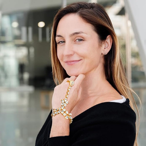 Elegant bridal hand jewelry styled for a traditional wedding sangeet or festive cultural dance.
