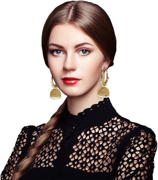 Handcrafted Indian-inspired filigree earrings with shimmering zircon stones and traditional bell charms.
