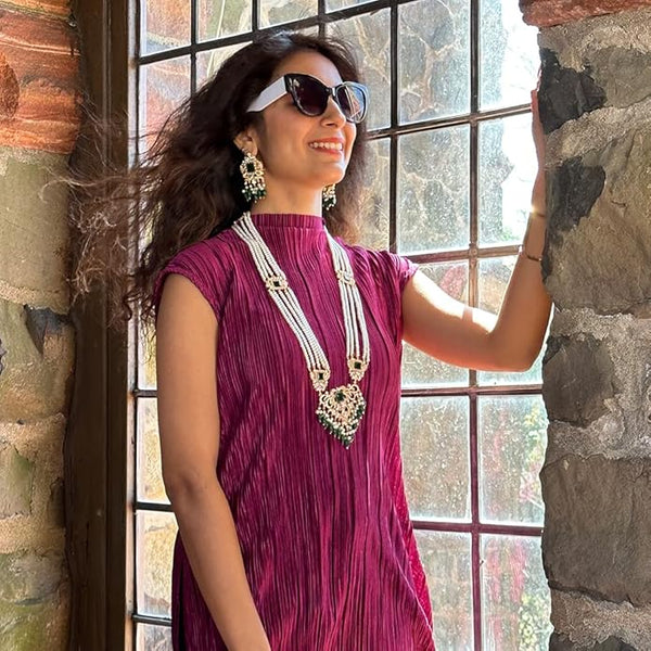  Matching dangle earrings with 4.5-inch removable pearl extension chain for versatile styling