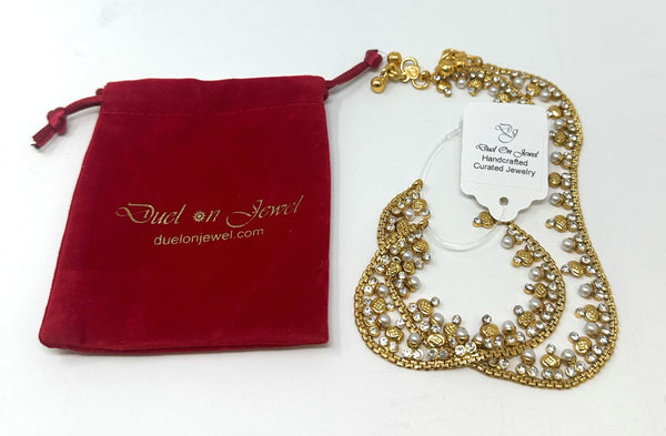 Versatile gold-plated ankle bracelets styled for bridal wear, dancing, or a casual beach outing.
