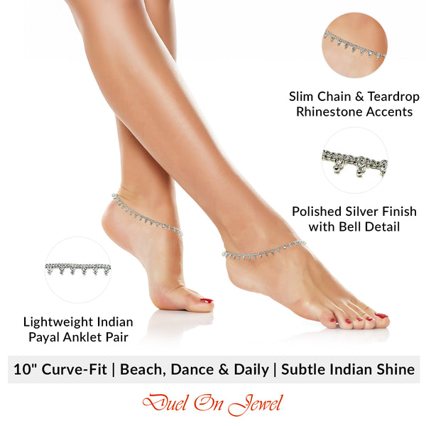 Handcrafted South Asian foot jewelry with shimmering rhinestones and traditional bell-shaped clasp details.
