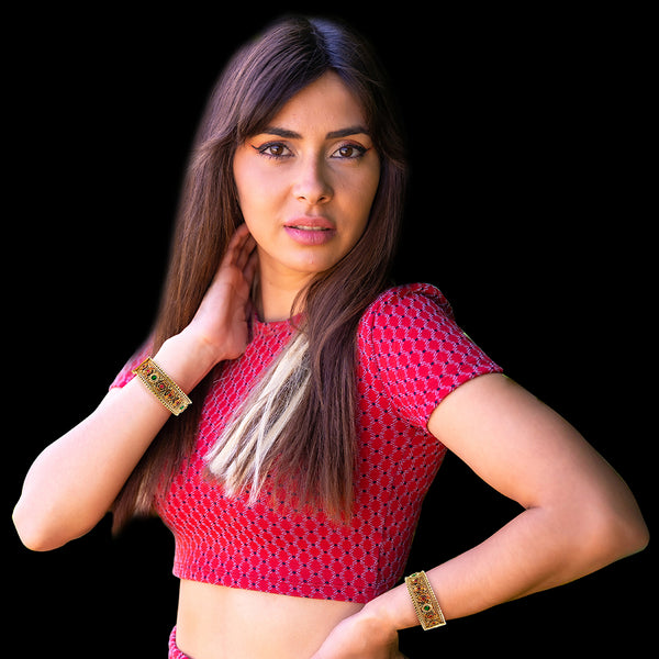 Close-up of floral motif with white pearl accents on Indian party bangles by Duel On Jewel.