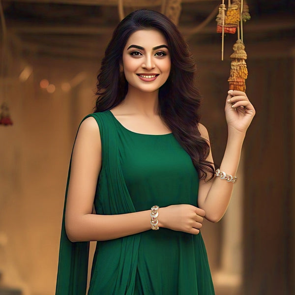 Smiling model wearing gold-tone Polki crescent moon enamel bangles with a party dress.