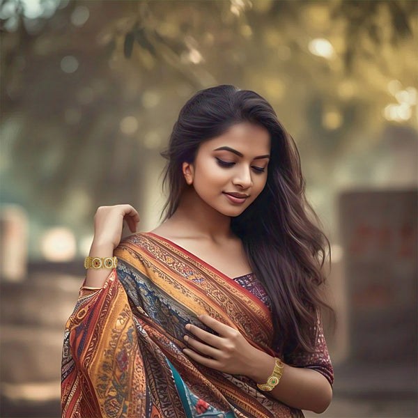 Side profile of model wearing a Pakistani bangle bracelet pair with gold-plated filigree detail.
