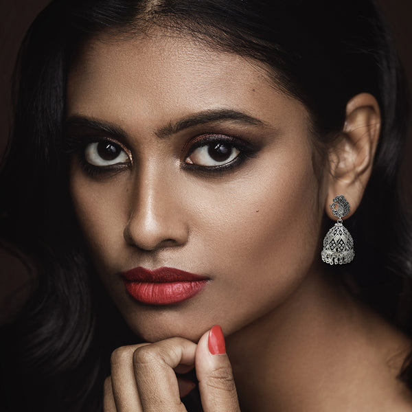 Statement sterling silver jhumka earrings worn with ethnic outfit for festive occasion styling
