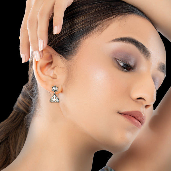 Lightweight 925 silver floral earrings styled with traditional Indian attire for cultural celebrations