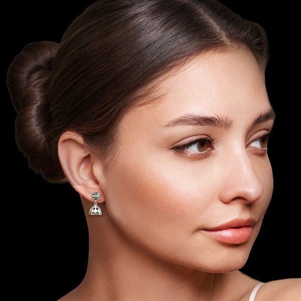 Sterling silver jhumka earring pair displayed in elegant silver gift box presentation