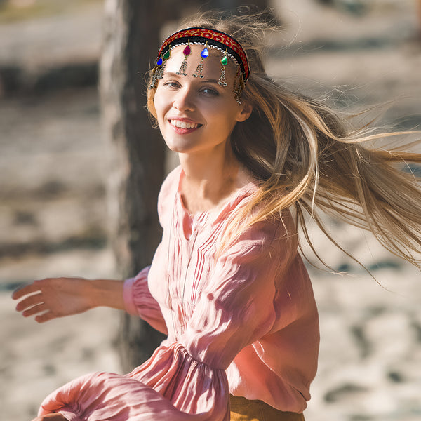 Side view of Duel On Jewel red embroidered fabric headband with bead bells – handmade cultural jewelry accessory